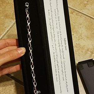 Sterling silver w/ 14kt rose gold around pink CZ